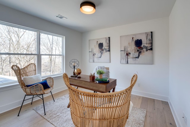 dining area with light wood-type flooring