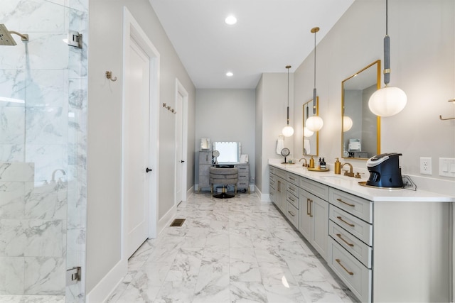 bathroom featuring vanity and walk in shower