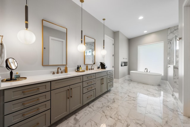 bathroom featuring vanity and a bathing tub