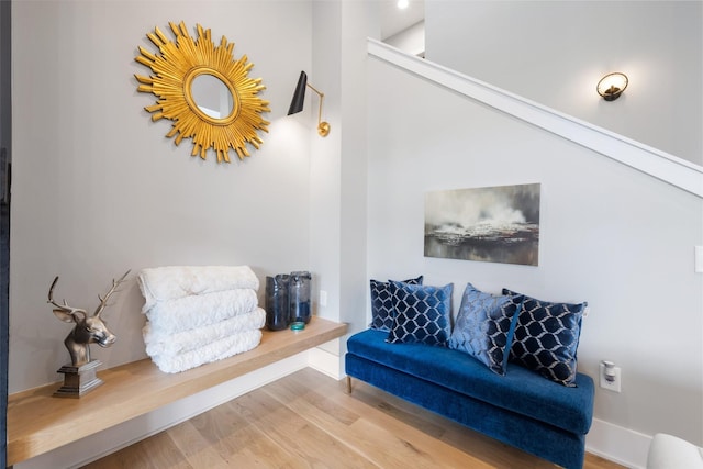 sitting room with hardwood / wood-style floors