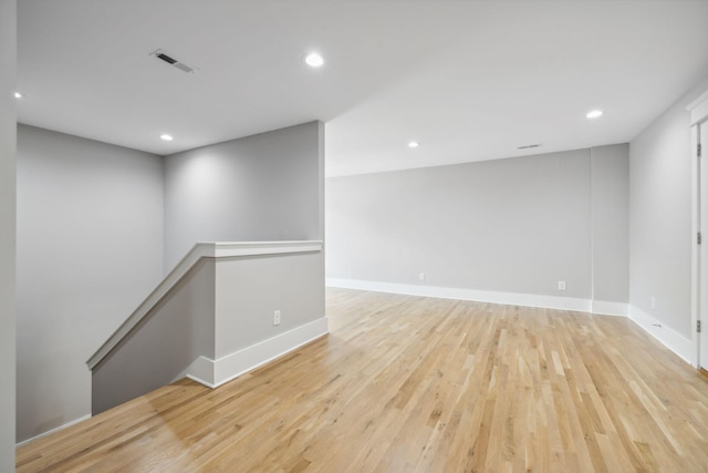 unfurnished room featuring light hardwood / wood-style floors