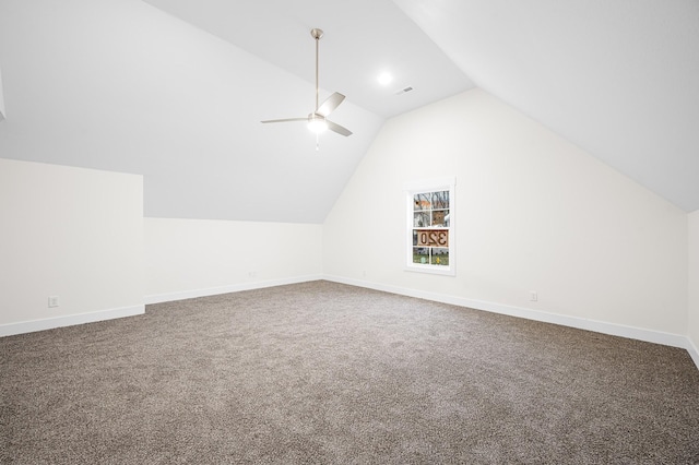 bonus room with vaulted ceiling, carpet floors, and ceiling fan