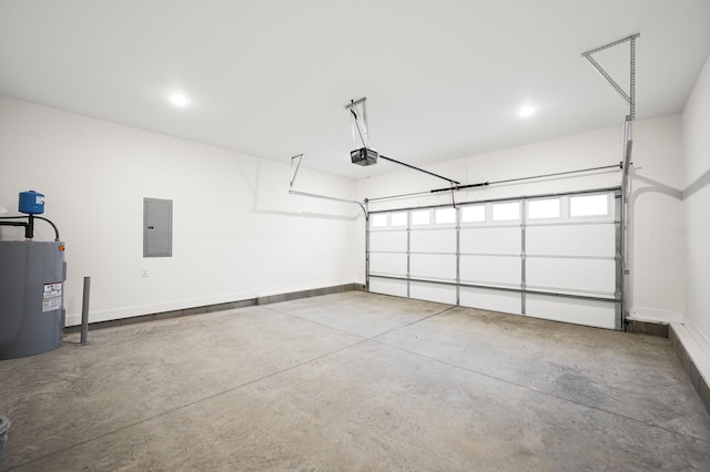 garage with a garage door opener, electric panel, and electric water heater