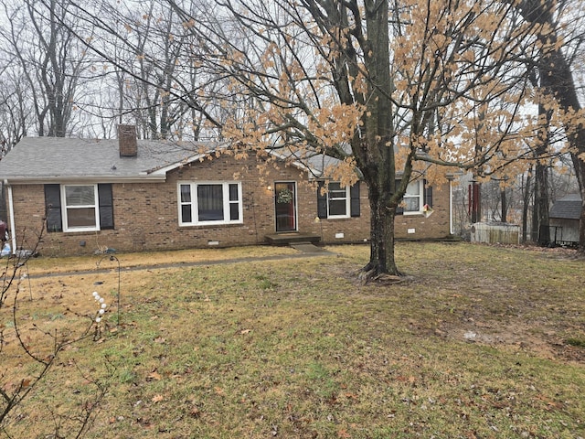 ranch-style home with a front lawn