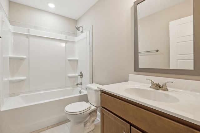 full bathroom with shower / tub combination, vanity, tile patterned floors, and toilet