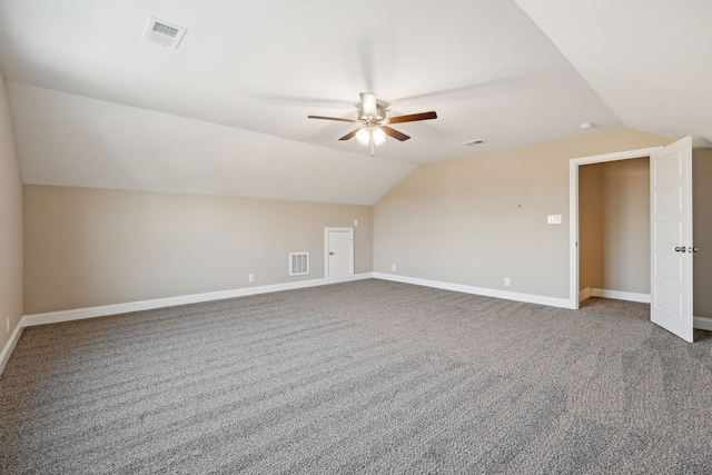 bonus room with carpet floors, vaulted ceiling, and ceiling fan