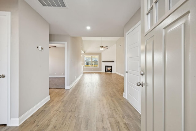 corridor featuring light hardwood / wood-style flooring