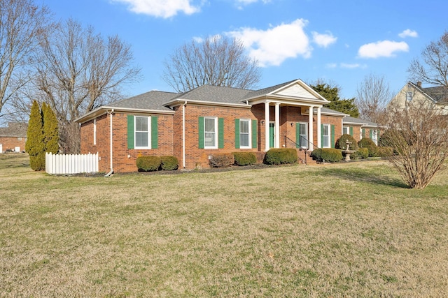 view of front of property with a front lawn