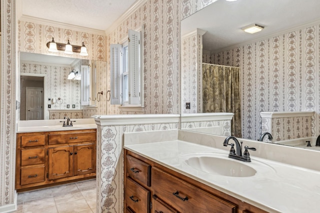 bathroom featuring ornamental molding, vanity, tile patterned floors, a textured ceiling, and a shower with shower curtain