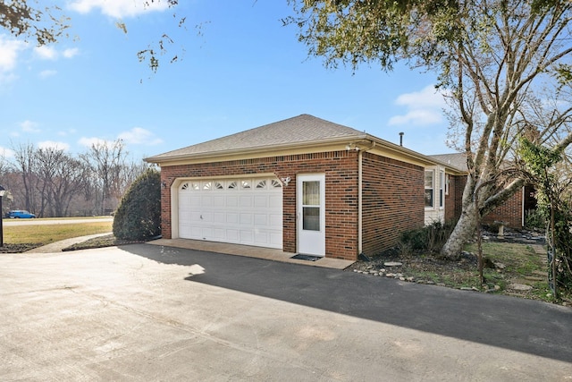 view of side of property featuring a garage