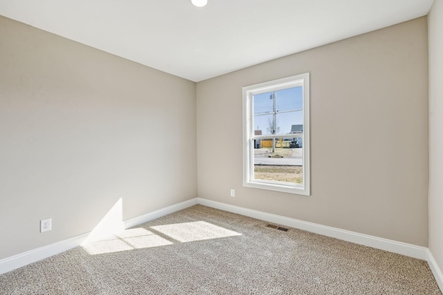 view of carpeted spare room