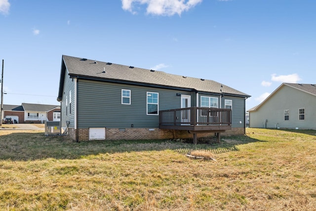 back of house with a wooden deck, a yard, and central air condition unit