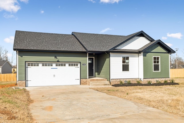 view of front of home with a garage