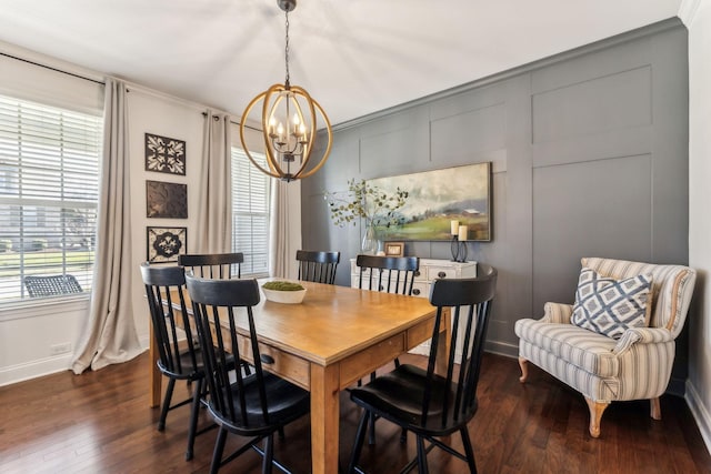 dining room featuring an inviting chandelier, dark hardwood / wood-style floors, and a wealth of natural light