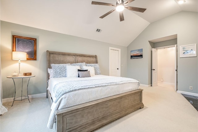 carpeted bedroom featuring lofted ceiling and ceiling fan