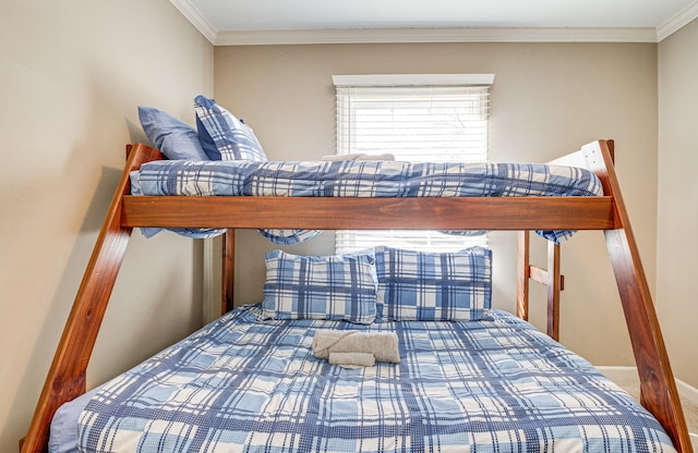 bedroom with crown molding