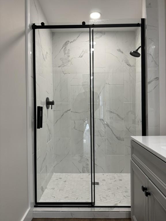 bathroom featuring vanity and walk in shower