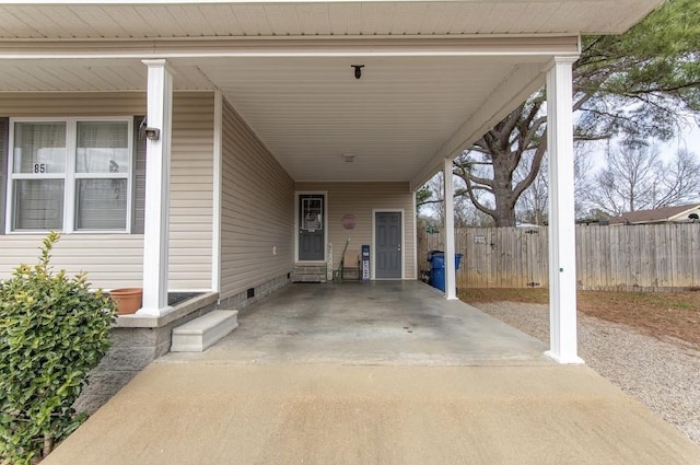 view of patio featuring a carport