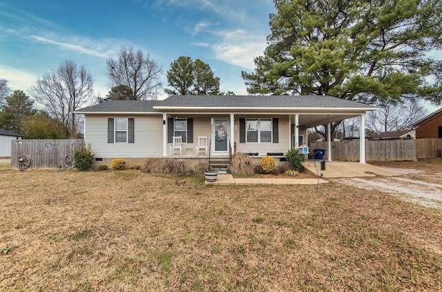 view of front of house featuring a carport, a porch, and a front lawn