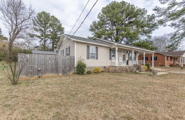 view of front of home featuring a front lawn and a porch