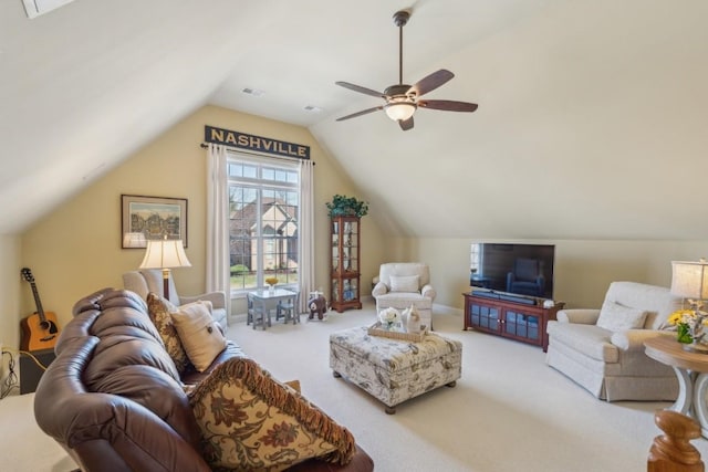 living room with lofted ceiling, carpet floors, and ceiling fan