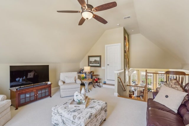 living room featuring lofted ceiling and light colored carpet