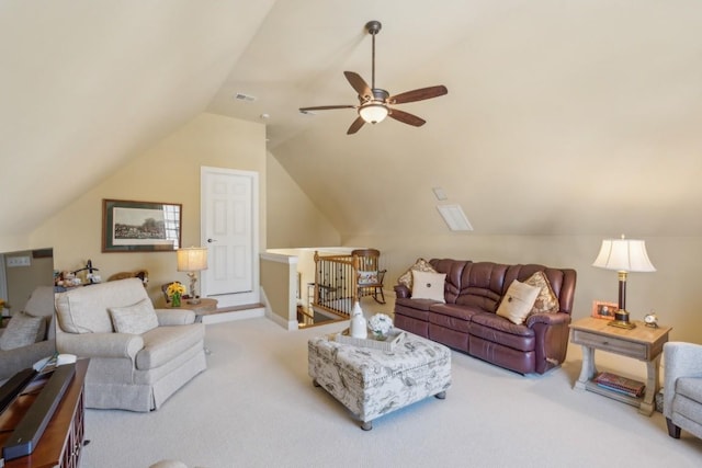 carpeted living room featuring vaulted ceiling and ceiling fan