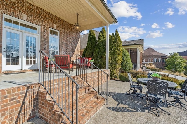 view of patio featuring ceiling fan