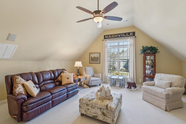 carpeted living room featuring ceiling fan and lofted ceiling