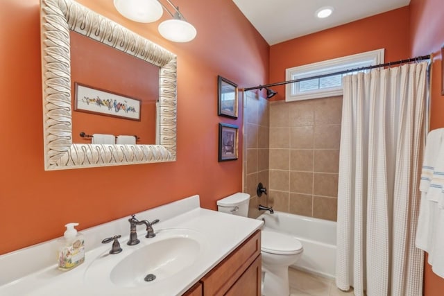 full bathroom with vanity, shower / tub combo with curtain, tile patterned floors, and toilet