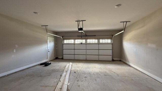 839 Stovers Gln, Murfreesboro, TN 37128 - garage featuring a garage door opener and baseboards