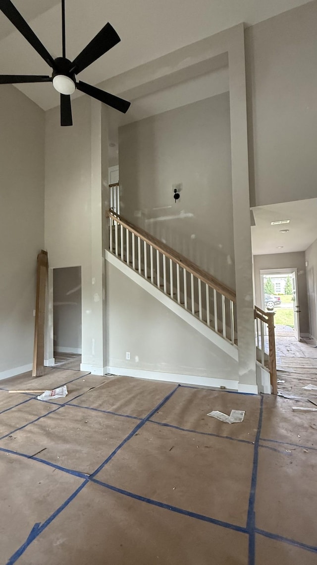 839 Stovers Gln, Murfreesboro, TN 37128 - unfurnished living room with ceiling fan and stairs