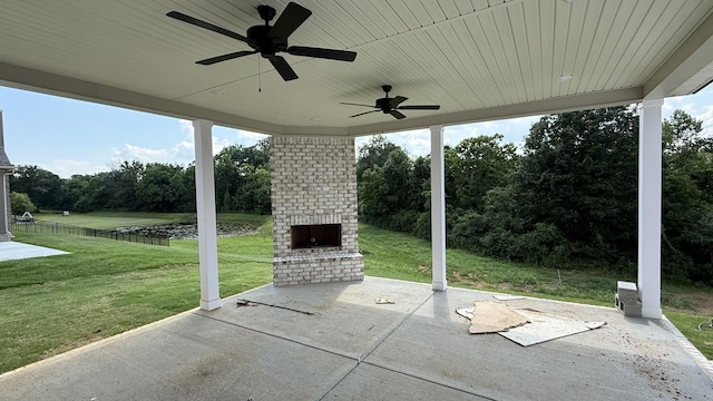 839 Stovers Gln, Murfreesboro, TN 37128 - view of patio with an outdoor brick fireplace, ceiling fan, and view of wooded area