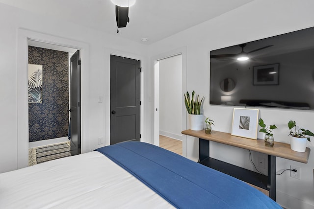 bedroom featuring wood-type flooring