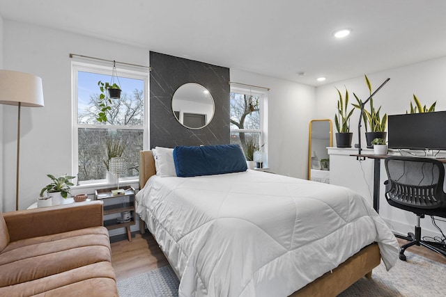 bedroom featuring light hardwood / wood-style floors