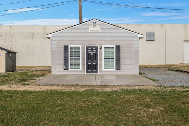 exterior space with a lawn