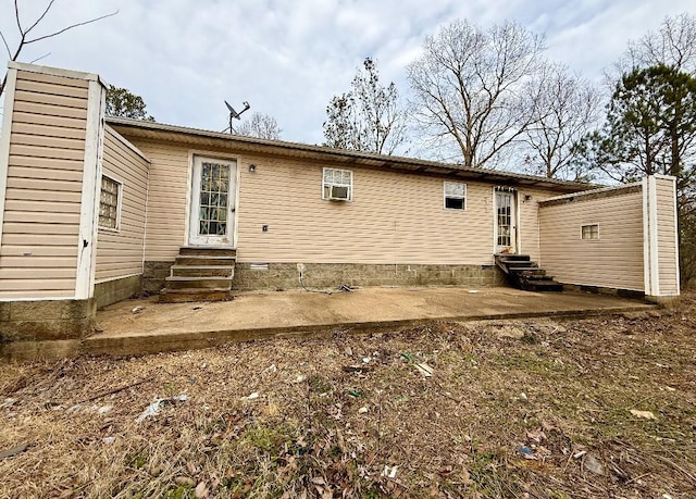 rear view of property with a patio