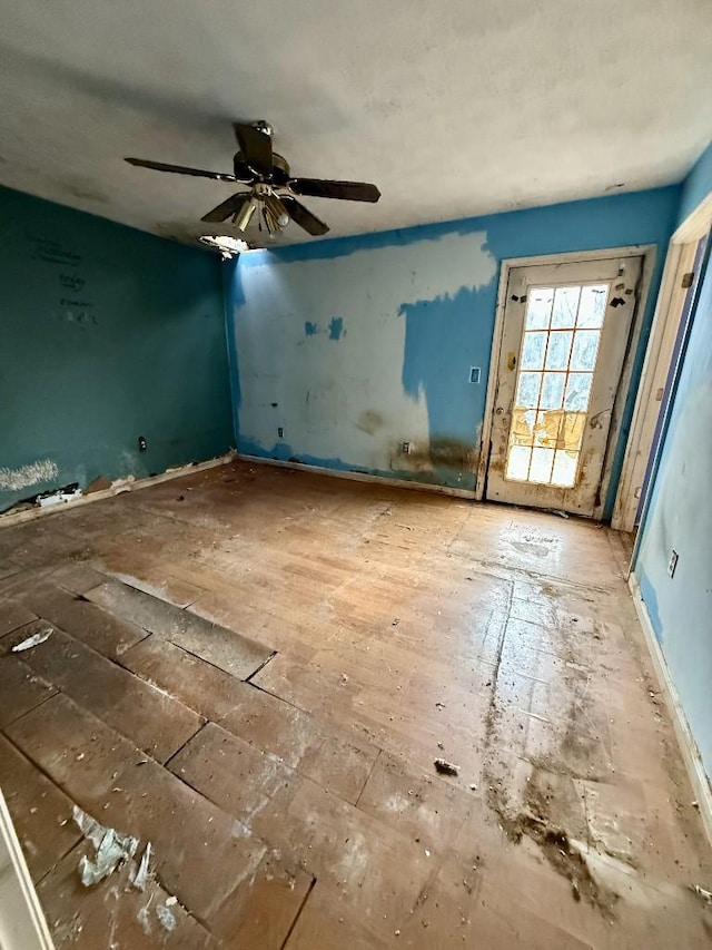 unfurnished room featuring ceiling fan