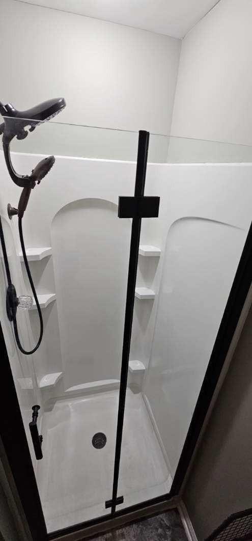 interior details with a stall shower