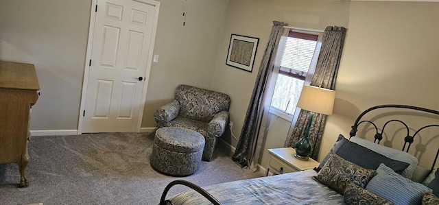 bedroom with carpet and baseboards