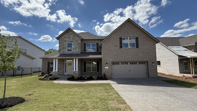835 Stovers Gln, Murfreesboro, TN 37128 - view of front of property featuring brick siding, fence, an attached garage, concrete driveway, and a front yard