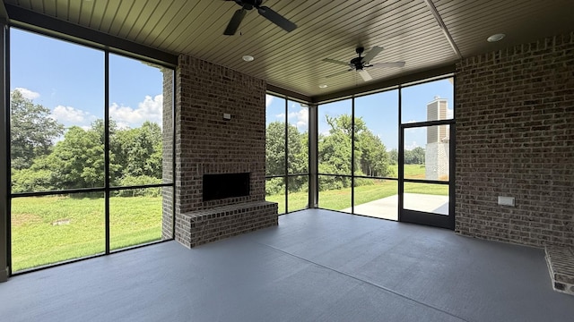 835 Stovers Gln, Murfreesboro, TN 37128 - unfurnished sunroom featuring a brick fireplace and ceiling fan