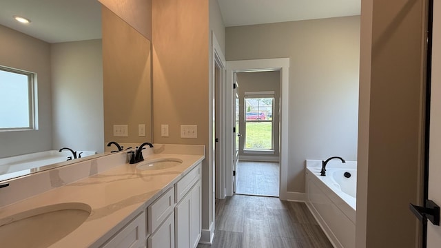 835 Stovers Gln, Murfreesboro, TN 37128 - bathroom featuring double vanity and a bath