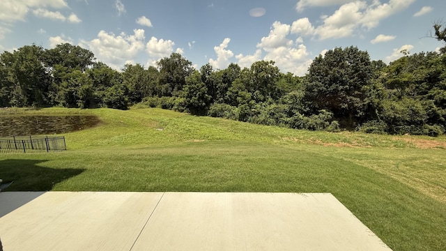 835 Stovers Gln, Murfreesboro, TN 37128 - view of yard featuring a patio area and a water view