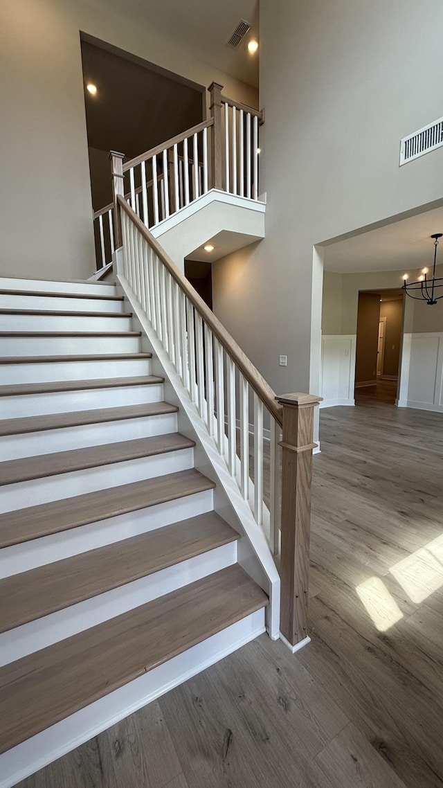 835 Stovers Gln, Murfreesboro, TN 37128 - stairs with a high ceiling, a chandelier, and wood finished floors
