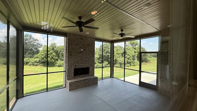 835 Stovers Gln, Murfreesboro, TN 37128 - unfurnished sunroom with ceiling fan and a brick fireplace