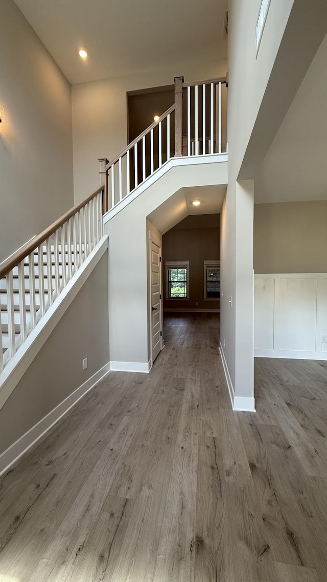 835 Stovers Gln, Murfreesboro, TN 37128 - foyer with wood finished floors, stairs, a towering ceiling, and recessed lighting