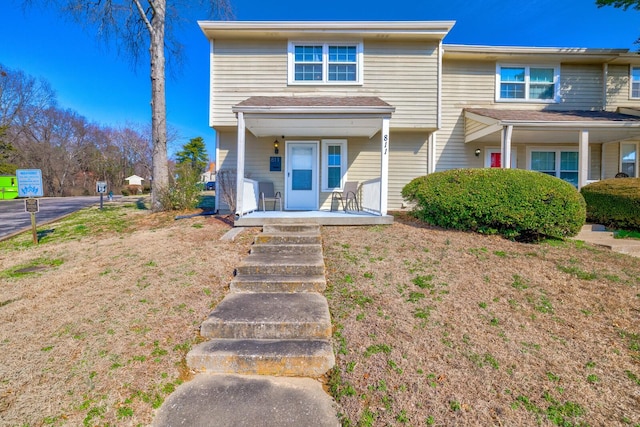 view of property with a porch