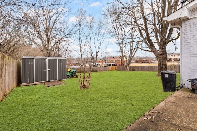 view of yard with a storage unit