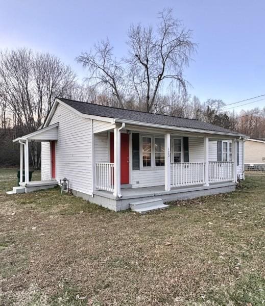 view of front facade with a porch and a front yard